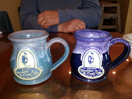 Picture of two another broken egg cafe mugs 