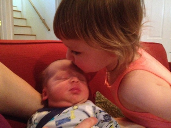 Eloise giving Theo a kiss